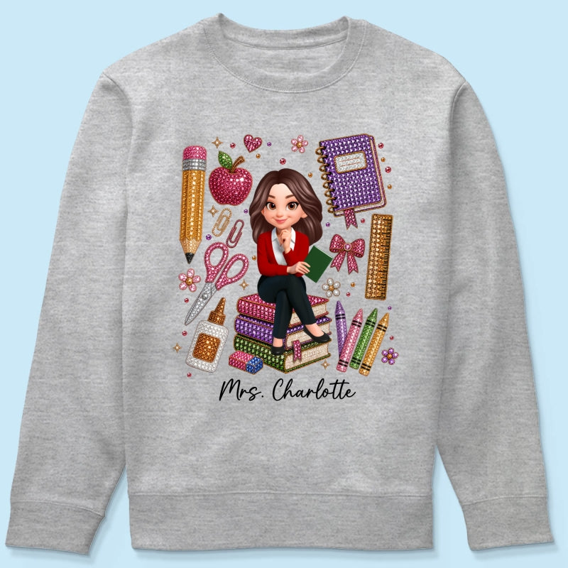 Teacher Sitting With School Supplies Faux Rhinestone – Personalized Shirt – Back To School Gift For Teacher