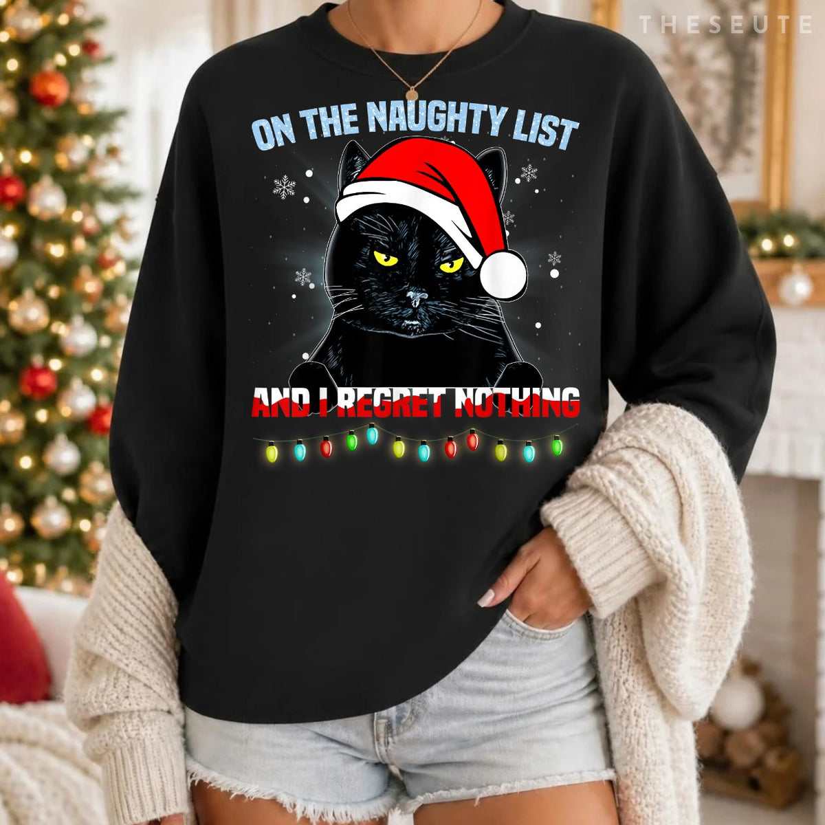 On The Naughty List And I Regret Nothing Cat Christmas Sweatshirt